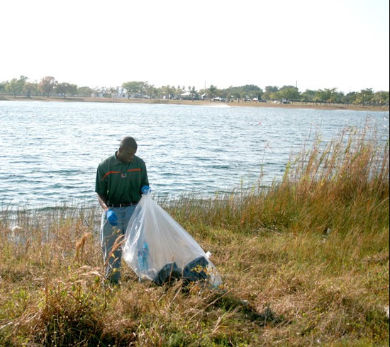 UM Staff, Coaches & Student Athletes volunteer at Amelia Earhart Park Community Service Project.