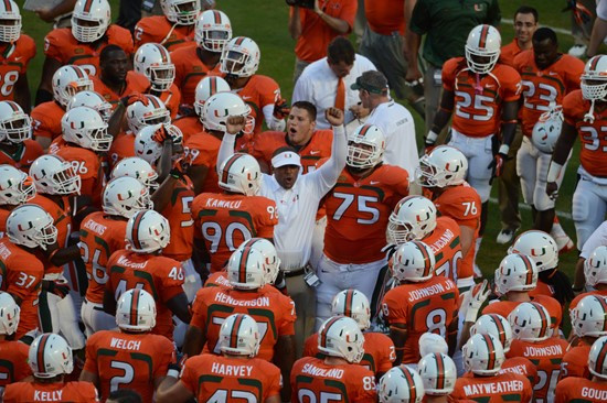 University of Miami Hurricane fans show their team spirit in a game against the Savannah State Tigers at Sun Life Stadium on September 21, 2013. ...