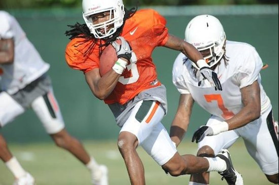 University of Miami Hurricanes wide receiver Travis Benjamin #3 catches a pass in drills at Greentree Practice Field on August 13 to prepare for the...