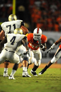 University of Miami Hurricanes defensive lineman, Steven Wesley #90, rushes in a game against Charleston Southern University in the Canes inaugural...