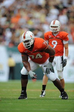 University of Miami Hurricanes offensive lineman Orlando Franklin #74 gets set to block against the University of Central Florida Knights at Dolphin...