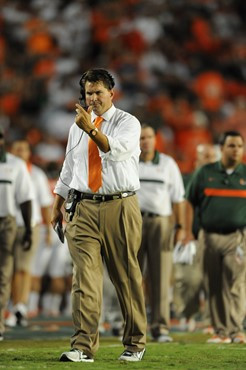 University of Miami Hurricanes head coach Al Golden calls in a play in a game against the Ohio State Buckeyes at Sun Life Stadium on September 17,...