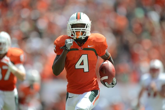 University of Miami Hurricanes wide receiver Phillip Dorsett #4 plays in a game against the North Carolina State Wolfpack at Sun Life Stadium on...