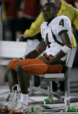 Miami cornerback Glenn Sharpe sits alone on the bench after losing their football game 14-13 to Maryland Saturday, Nov. 11, 2006 in College Park,...
