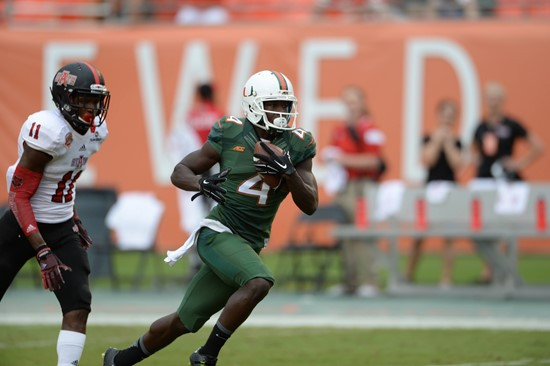 University of Miami Hurricanes wide receiver Phillip Dorsett #4 catches a touchdown pass from quarterback Brad Kaaya in a game against the Arkansas...