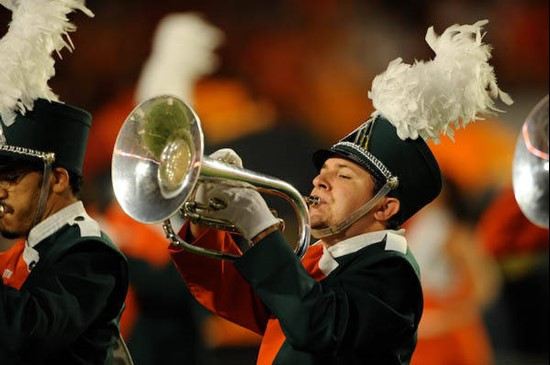 A University of Miami Band of the Hour participant entertains the crowd in a game against the Virginia Tech Hokies at Dolphin Stadium on November 13,...