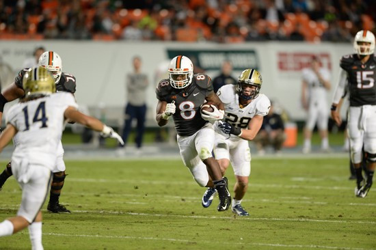 University of Miami Hurricanes running back Duke Johnson #8 plays in a game against The Pittsburgh Panthers at Sun Life Stadium on November 29, 2014. ...