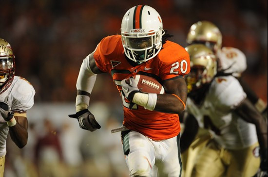University of Miami Hurricanes running back Damien Berry #20 carries the ball against the Florida State Seminoles at Sun Life Stadium on October 9,...