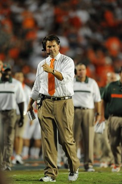 University of Miami Hurricanes head coach Al Golden calls in a play in a game against the Ohio State Buckeyes at Sun Life Stadium on September 17,...