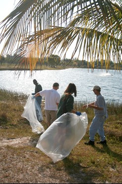 UM Staff, Coaches & Student Athletes volunteer at Amelia Earhart Park Community Service Project.