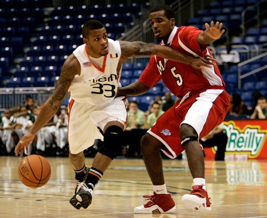 Jack McClinton dribbles the ball guarded by Marist's Jay Gavin. (AP Photo/Andres Leighton)