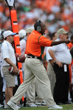 Head coach Randy Shannon calls in a play to his University of Miami Hurricanes during a game against the North Carolina Tar Heels at Dolphin Stadium...