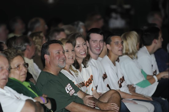 Friends and family of Ron Fraser listen to reflections during Saturday's 