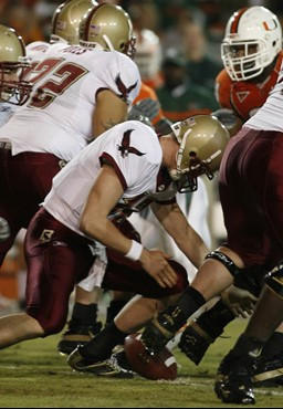 Boston College quarterback Matt Ryan fumbles the ball on a snap from the center during the second quarter of a college football game against the Miami...
