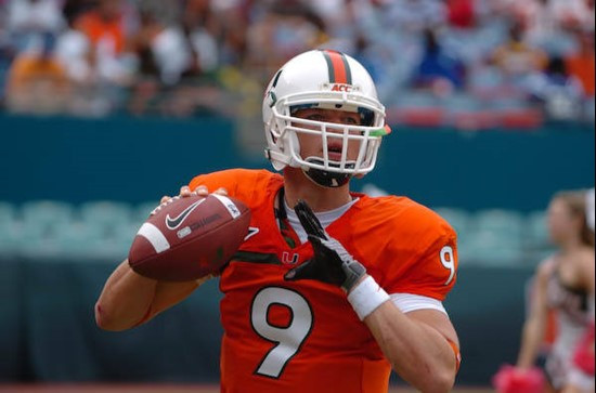 University of Miami Hurricanes quarterback Robert Marve #9 warms up on the sidelines during a game against the University of Central Florida Knights...