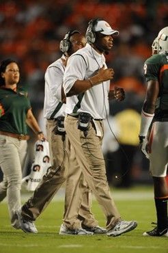 University of Miami Hurricanes linebacker coach Michael Barrow gives some last minute instructions in a game against the Florida A&M Rattlers at Land...