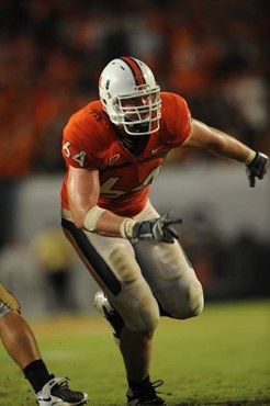 University of Miami Hurricanes offensive tackle Jason Fox #64 plays in a game against the Georgia Tech Yellow Jackets at Land Shark Stadium on...