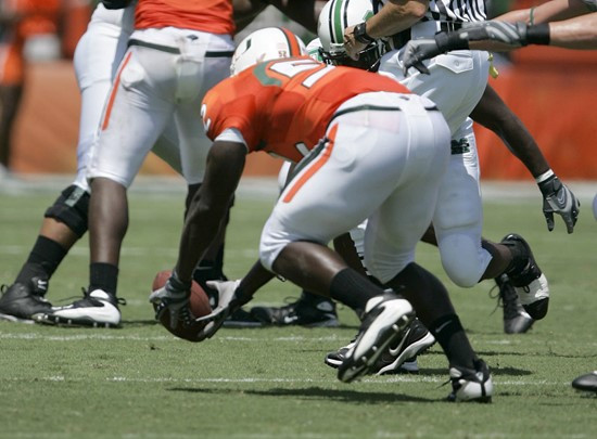 Miami linebacker Tavares Gooden intercepts a pass during the first quarter of a football game against Marshall Saturday, Sept. 1, 2007, in Miami. (AP...