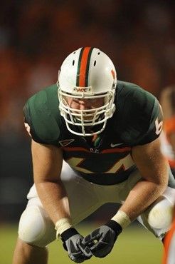 University of Miami Hurricanes offensive tackle Jason Fox #64 gets set to block in a game against the Florida A&M Rattlers at Land Shark Stadium on...