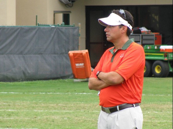 Jedd Fisch watches his offense go to work during a team drill.