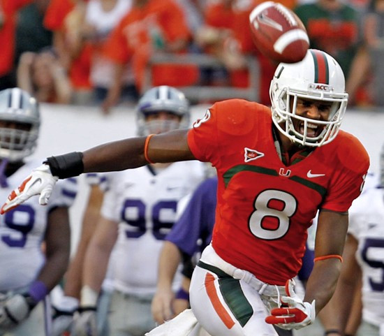 Miami's Tommy Streeter watches an incomplete throw by quarterback Jacory Harris in the fourth quarter of an NCAA college football game against Kansas...