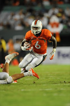 University of Miami Hurricanes running back Lamar Miller #6 ran for 188 yards in a game against the Ohio State Buckeyes at Sun Life Stadium on...