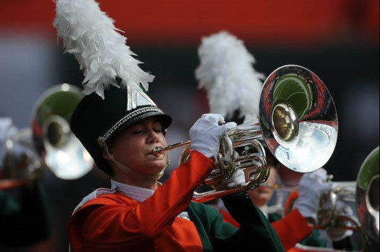 A University of Miami Band of the Hour participant entertains the crowd in a game against the Deamon Deacons of Wake Forest at Dolphin Stadium on...