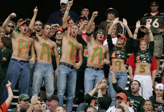 Miami foorball fans cheer as the Hurricanes come onto the field before the start of the Maryland-Miami college football game Saturday, Nov. 11, 2006...