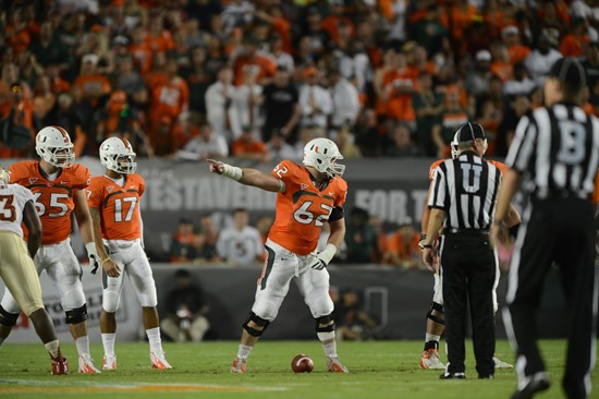 University of Miami Hurricanes offensive lineman Shane McDermott #62 plays in a game against the Florida State Seminoles at Sun Life Stadium on...