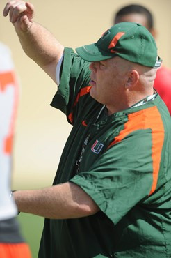 University of Miami Offensive Line Coach, Art Kehoe, instructs his team on how he wants them to execute his game plan during a spring practice at...