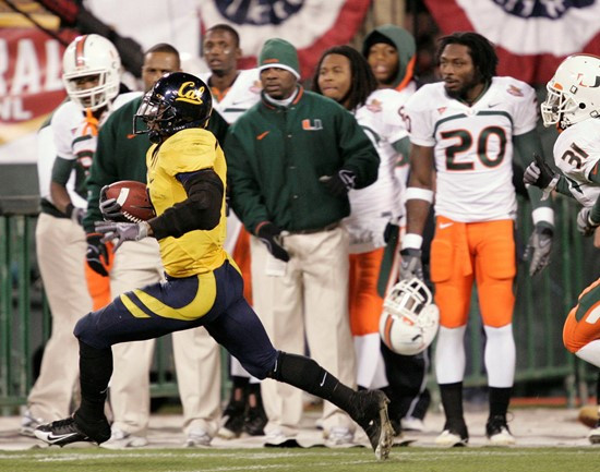 California running back Jahvid Best runs along the Miami sideline in the first half of the Emerald Bowl NCAA in San Francisco, Saturday, Dec. 27,...