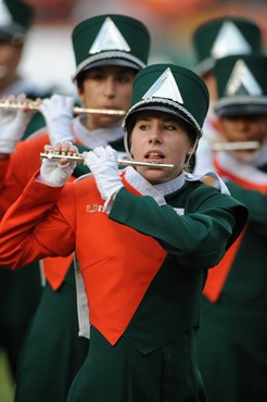 A University of Miami Band of the Hour participant entertains the crowd in a game against the University of Central Florida Knights at Dolphin Stadium...