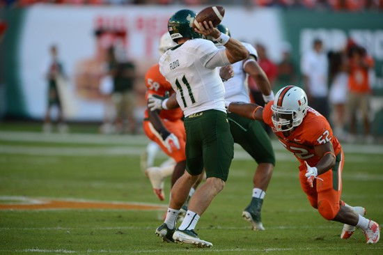 University of Miami Hurricanes linebacker Denzel Perryman #52 plays in a game against the University of South Florida Bulls at Sun Life Stadium on...