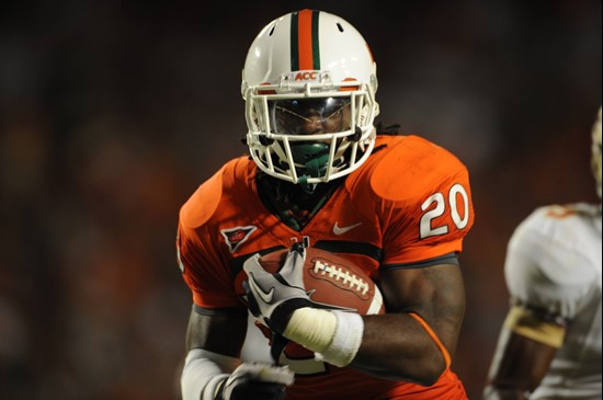 University of Miami Hurricanes running back Damien Berry #20 carries the ball against the Florida State Seminoles at Sun Life Stadium on October 9,...