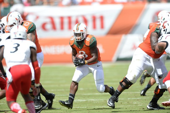 University of Miami Hurricanes running back Duke Johnson #8 plays in a game against the Cincinnati Bearcats at Sun Life Stadium on October 11, 2014.  ...