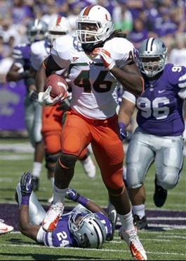 Miami tight end Clive Walford (46) breaks away from Kansas State defensive back Nigel Malone (24) during the first half of an NCAA football game in...