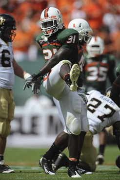 University of Miami Hurricanes linebacker Sean Spence #31 celebrates after making a tackle in a game against the Deamon Deacons of Wake Forest at...