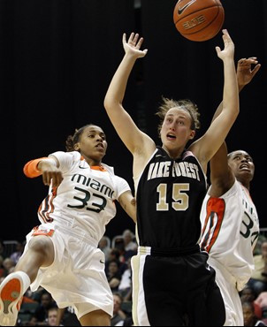 Wake Forest's Millesa Calicott loses control of the ball as Miami's Suriya McGuire and Sylvia Bullock. (AP Photo/Lynne Sladky)