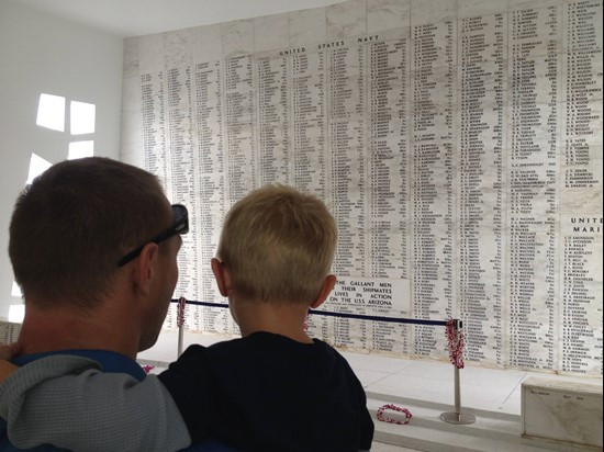 Coach Krumpos and his son at Pearl Harbor