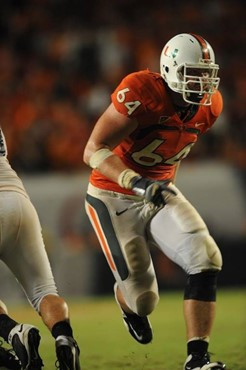 University of Miami Hurricanes offensive tackle Jason Fox #64 plays in a game against the Georgia Tech Yellow Jackets at Land Shark Stadium on...