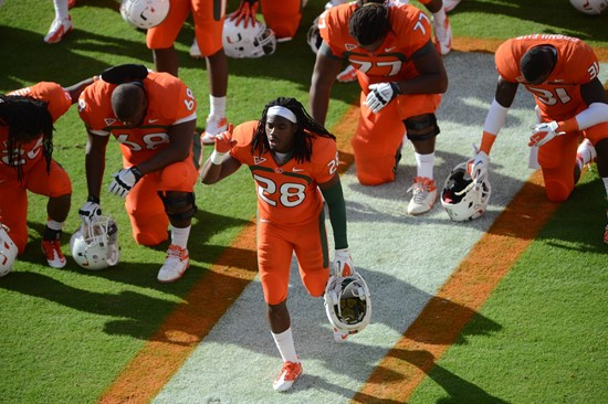 University of Miami Hurricanes wide receiver Shawn O?Dare #28 plays in a game against the University of South Florida Bulls at Sun Life Stadium on...