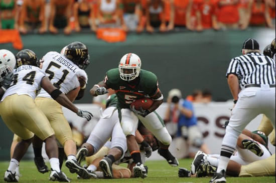 University of Miami Hurricanes running back Javarris James #5 carries the ball against the Deamon Deacons of Wake Forest at Dolphin Stadium on October...