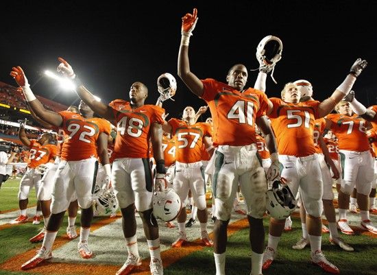 Miami players celebrate after defeating Ohio St. 24-6 in an NCAA college football game, Saturday, Sept. 17, 2011, in Miami. (AP Photo/Wilfredo Lee)