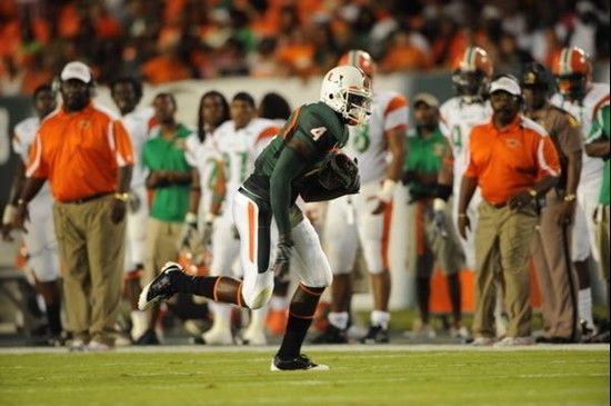 University of Miami Hurricanes wide receiver Aldarius Johnson #4 catches a pass against the Florida A&M Rattlers at Land Shark Stadium on October 10,...