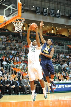 University of Miami Hurricanes center, Reggie Johnson #42, plays host to 2010 NCAA Final Four participant West Virginia at the BankUnited Center on...