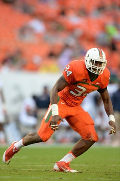 University of Miami Hurricanes linebacker Thurston Ambrister #34 plays in a game against the Virginia Cavaliers at Sun Life Stadium on November 23,...