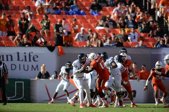 University of Miami Hurricanes linebacker Tyriq McCord #17 plays in a game against the Virginia Cavaliers at Sun Life Stadium on November 23, 2013. ...