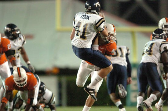 University of Miami Hurricanes linebacker Colin McCarthy #44 blocks a Chris Cook #41 punt in a game against the Florida International University...
