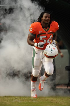 University of Miami Hurricanes linebacker Marcus Robinson #56 plays in a game against the Boston College Eagles at Sun Life Stadium on November 25,...