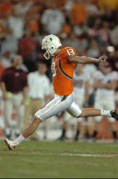 University of Miami Hurricanes kicker Jon Peattie #13 kicks a 55 yard field goal in the third quarter against the Virginia Tech Hokies at the orange...